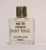 Photo © Les-parfums.info le site Guerlain - Habit Rouge - Bouchon doré 4 ml eau de cologne mod 1978