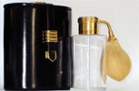 Photo © Les-parfums.info le site Guerlain - Flacon de voyage - Flacon de voyage en Baccarat pochette en cuir noir lisse