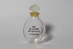 Photo © Les-parfums.info le site Guerlain - Mitsouko - Goutte G1 bouchon en patte de verre 