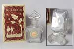 Photo&nbsp;&copy;&nbsp;Les-parfums.info le site Guerlain - Mitsouko -  Flacon du parfum dit flacon bouchon coeur Hauteur 10.5 cm en cristal de Baccarat bouchon en cristal émerisé