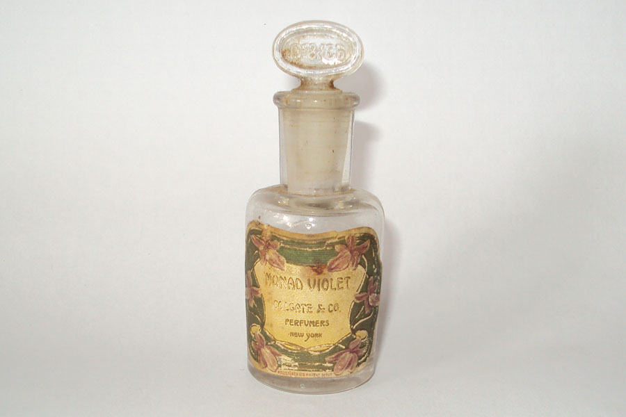 Flacon Monad violet de Colgate & Cie Hauteur 8 cm environ bouchon emery 