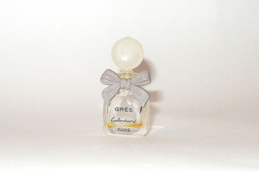 Miniature Cabochard de Grès Noeud plastique gris hauteur 3.6 cm 