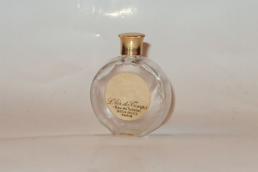 Miniature L'Air du Temps de Ricci Nina Flacon Montre Eau de toilette bouchon metal tetine caoutchouc  