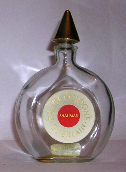 Flacon Shalimar de Guerlain Flacon Montre bouchon plastique doré 50 ml 
