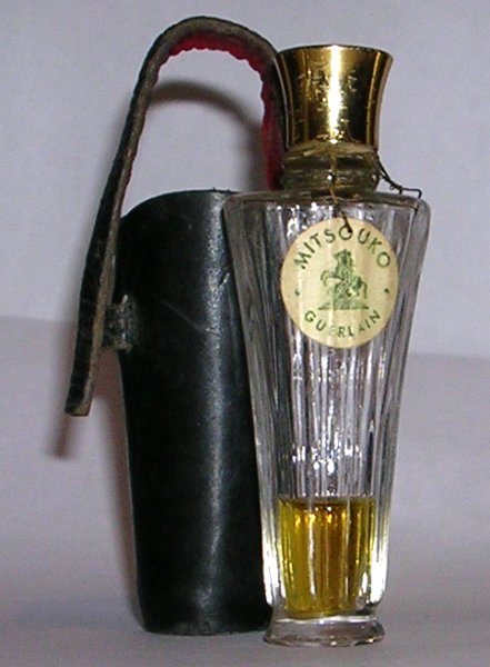 Flacon Mitsouko de Guerlain Flacon de sac Etiquette Chevaux de Marly pochette en cuir noir modele export USA  