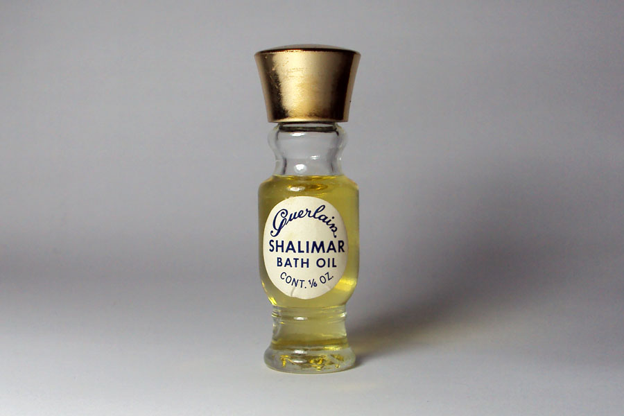 Miniature Shalimar de Guerlain Bath Oil cont 1/6 OZ bouchon doré ( standart de reconditionnement une habitude au USA ) hauteur 6.2 cm  