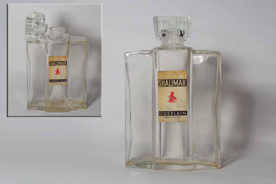 Photo&nbsp;&copy;&nbsp;Shalimar - Flacon de Guerre 80 cm 3 bouchon émeri hauteur 10.2 cm