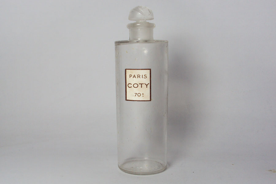 Flacon Paris de Coty Bouchon émeri Hauteur 8.8 cm ( à vérifier si réelement coty ) 