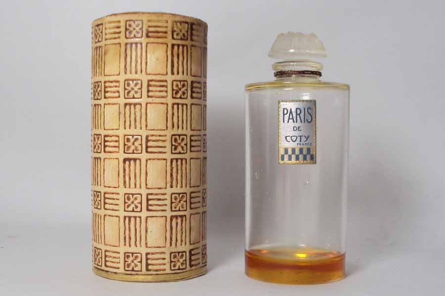 Flacon Paris de Coty Petit flacon rond numeroté bouchon emeri Hauteur 6.8 cm 