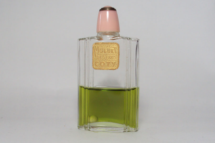 Flacon Muguet des bois de Coty Bouchon métal et bakélite hauteur 6.8 cm 