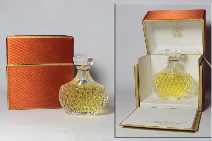 Flacon Capricci de Ricci Nina Flacon du parfum signé Lalique ( à la main ) hauteur 6.7 cm 